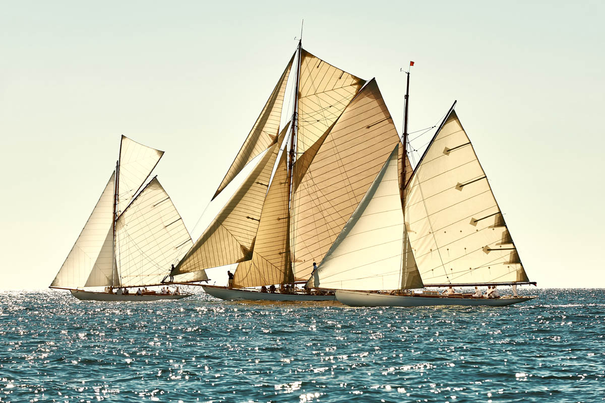 Classic yachts under full sail at the regatta. Sailing race. Yachting Classic yachts under full sail at the regatta. Sailing race. Yachting