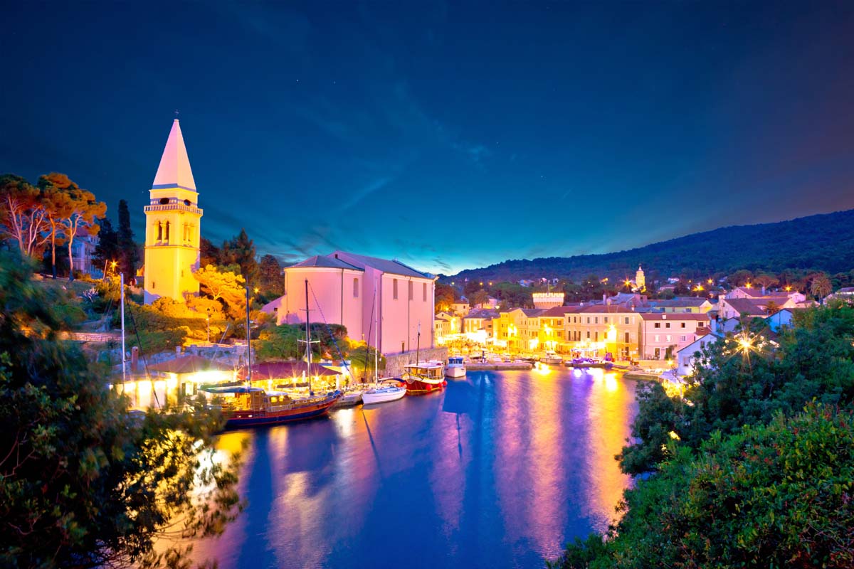 Island of Losinj. Town of Veli Losinj bay evening view. Kvarner bay archipelago of Croatia Island of Losinj. Town of Veli Losinj bay evening view. Kvarner bay archipelago of Croatia