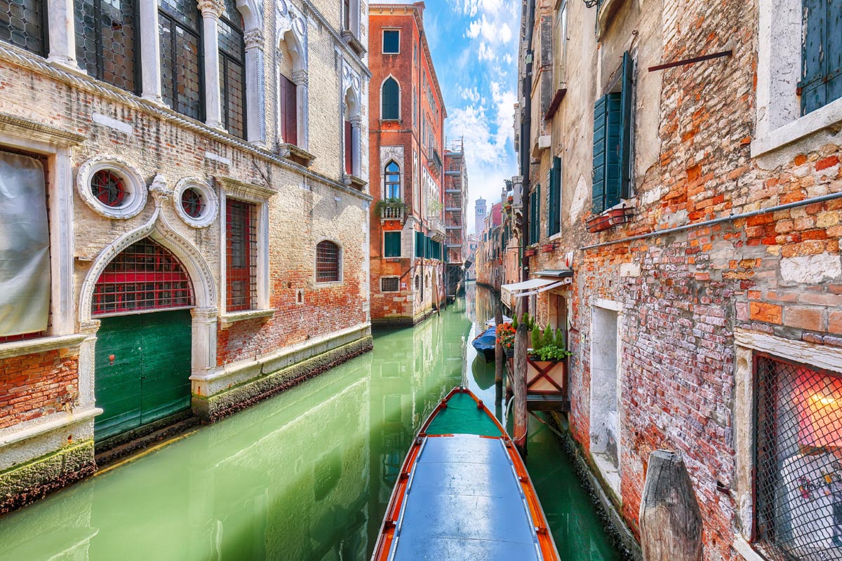 VENICE narrow-canals-boats-and-gondolas-and-bridges-with-traditional buildings VENICE narrow-canals-boats-and-gondolas-and-bridges-with-traditional buildings
